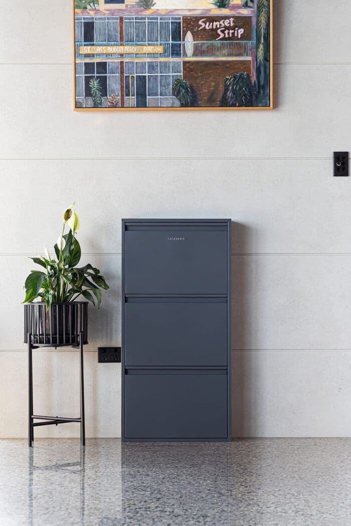 Dark Grey CASA DORA Trinity 3 Door Storage Cabinet on entry wall